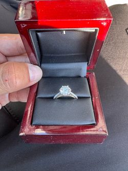 1.29 carat diamond ring with 2 rubies on side, 2 toned yellow gold and white gold