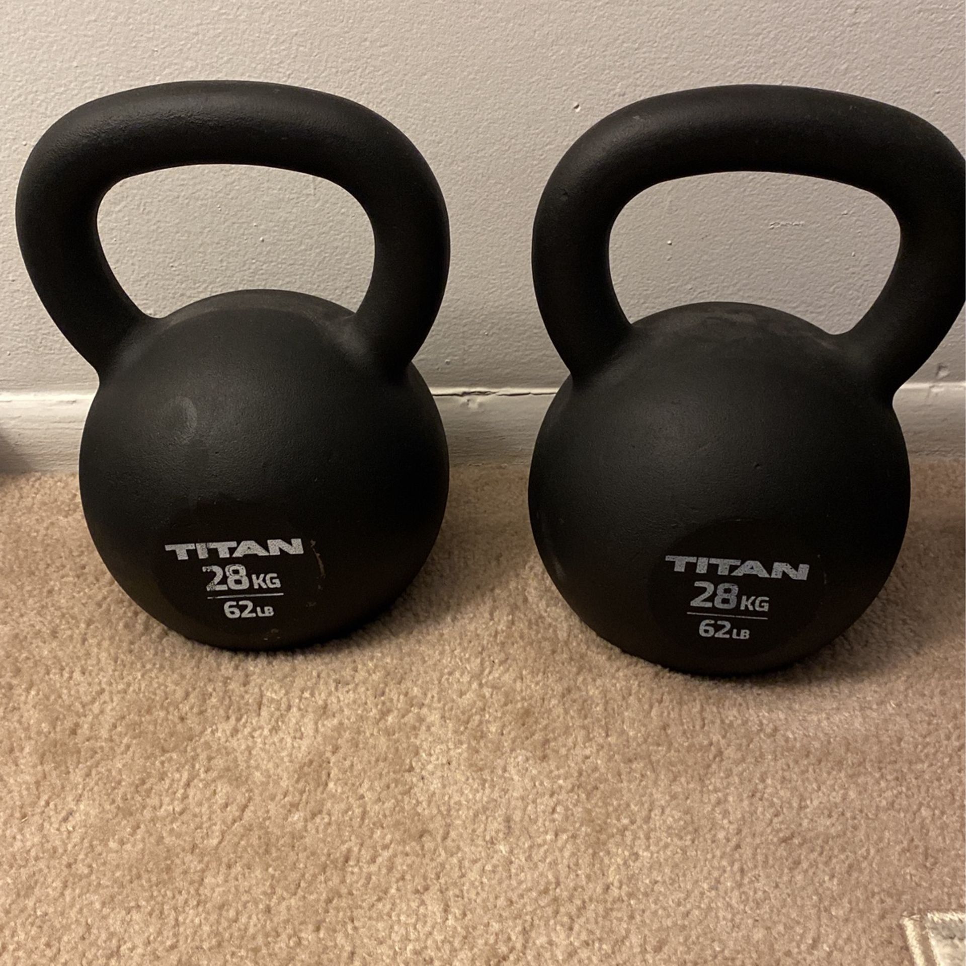 Pair Of 28 Kg Titan Kettlebells