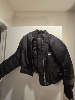 A* Woman's motorcycle jacket. Size Xs