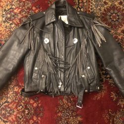 Fringed woman’s leather jacket by Fureal ltd. Size 36. 