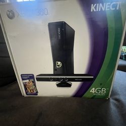 xbox 360 semi new with its box and control. He also has his kinect