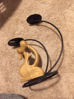 Hand carved wood candle holder.