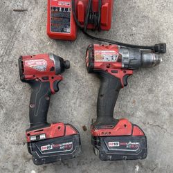 Set De Taladros Milwaukee Con Baterias 5.0 Y Su Cargador Trabajan perron $220
