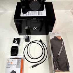 Alpha a7 IV Mirrorless Camera with Extra Battery and Peak Design SlideLITE