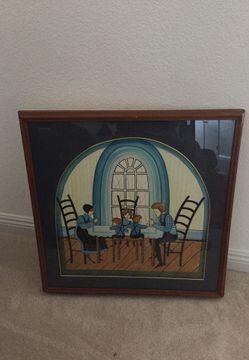 Paint on wood artwork. Nice frame.