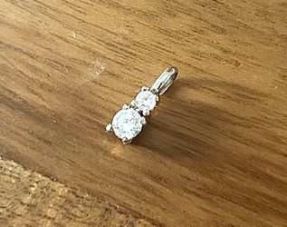 Two-stone stacked drop pendant crafted with brilliant round-cut cubic zirconia