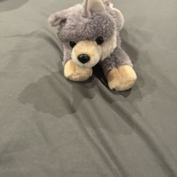     +5 This is an Aurora Mini Flopsie Woolsey Wolf stuffed animal. 