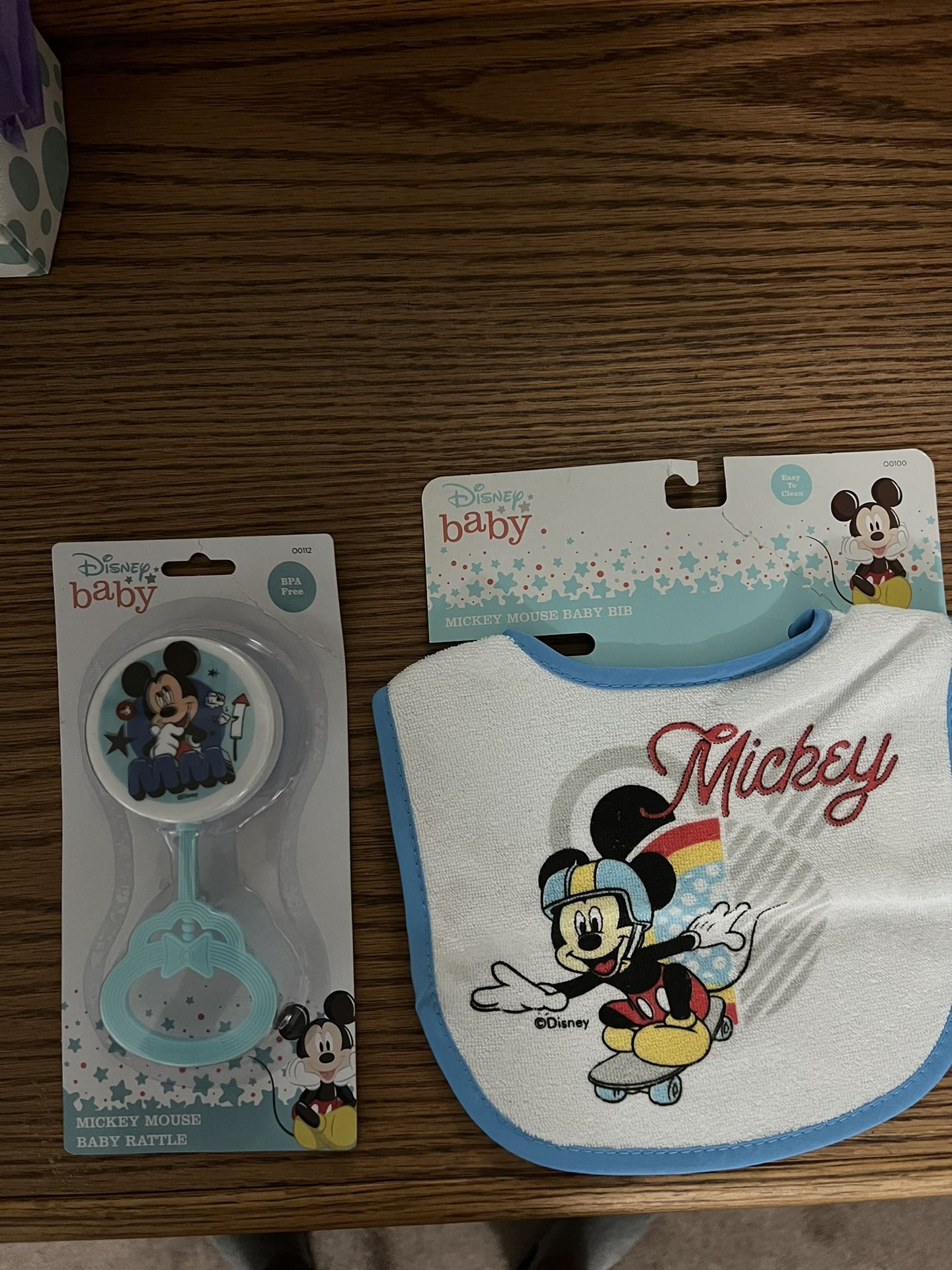 NEW Disney baby blue/white Mickey Mouse bib and bpa free rattle