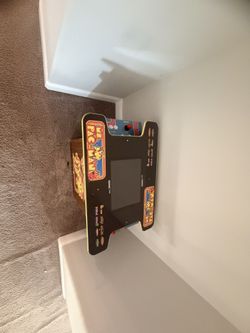 Ms. Pac-Man Video Game with 6 other games console.