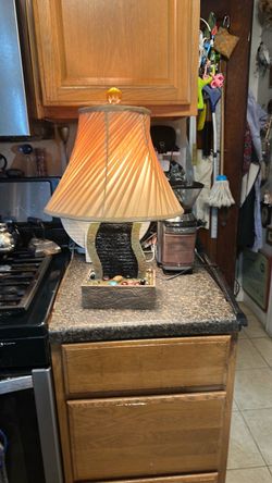 Vintage table lamp with a water fountain.