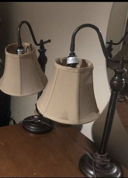 2 brown and beige night table lamps