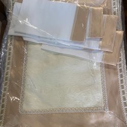 Beautiful satin fabric, gold, cream and white placemat and napkins