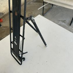 Black Schwinn folding rear rack for bikes. Includes all parts and instructions. Brand new.  Pick up only in Brookline village, 02445. 5 mins walk to D