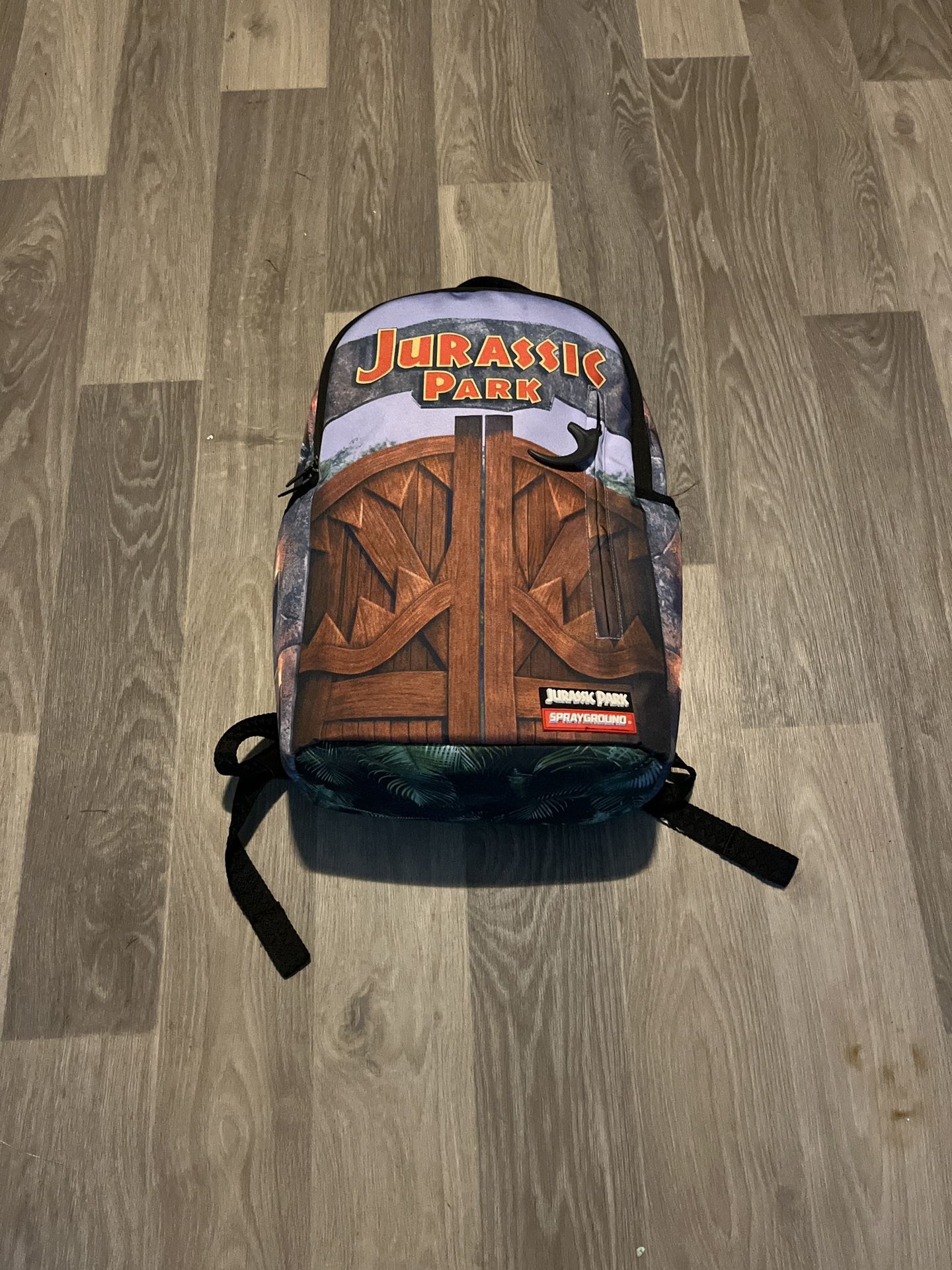 SPRAYGROUND WELCOME TO JURASSIC PARK ENTRANCE LIMITED EDITION BACKPACK