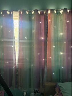 3, 3 toned color curtains with stars