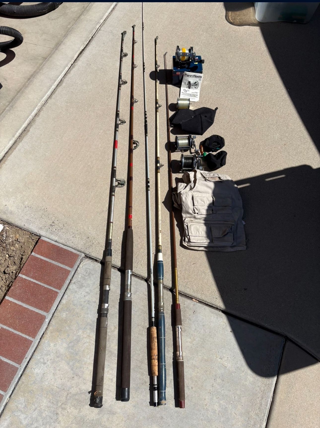 5 Fishing Rods & 3 Penn Reels