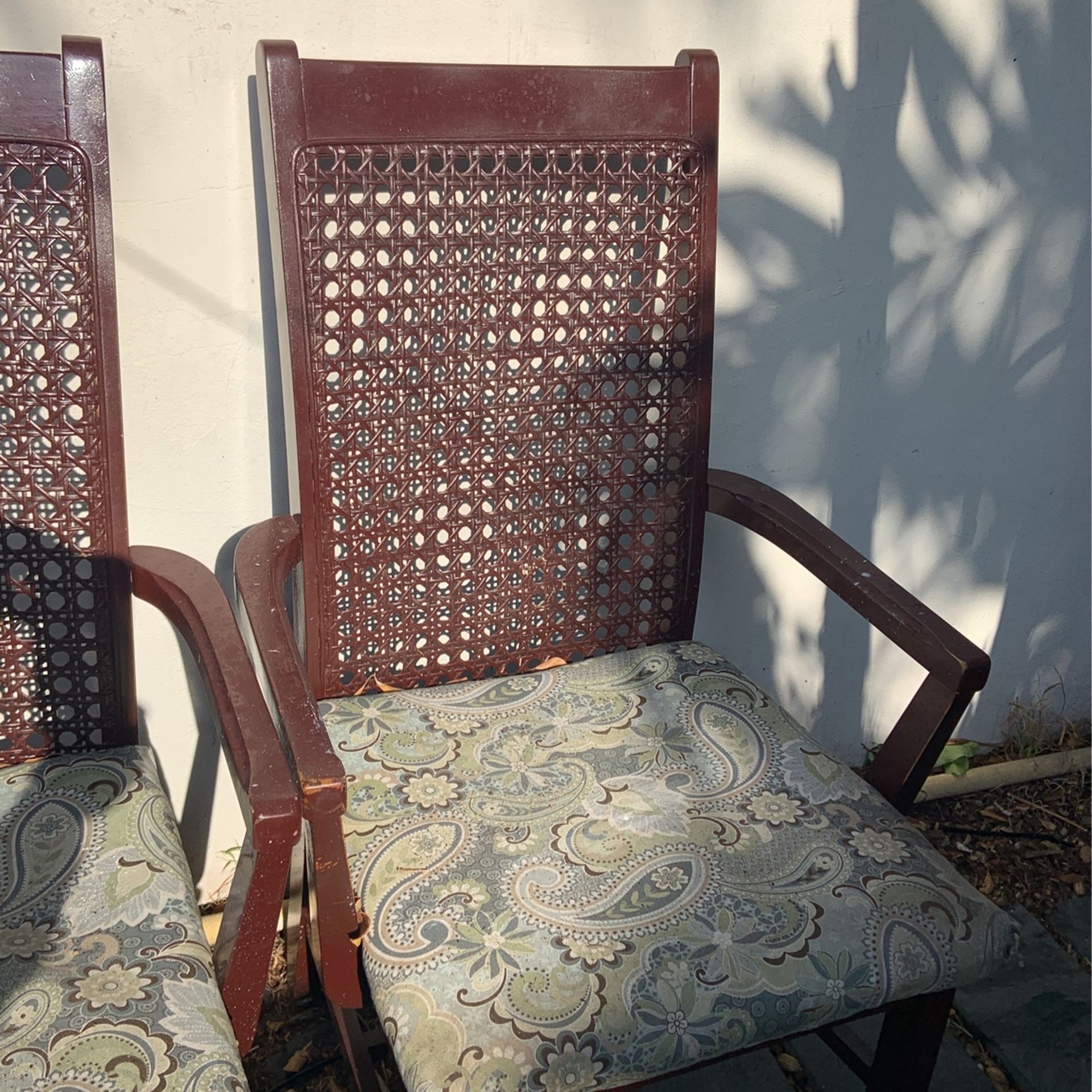 Solid wood, two Arm Cane Chairs From The 70’s...chairs need restoring...cane In Good Condition