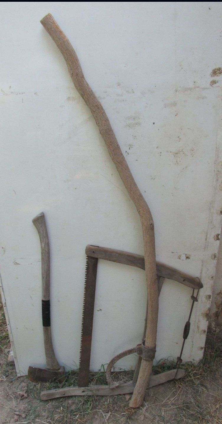 Bow Saw, Log Roller, And Axe