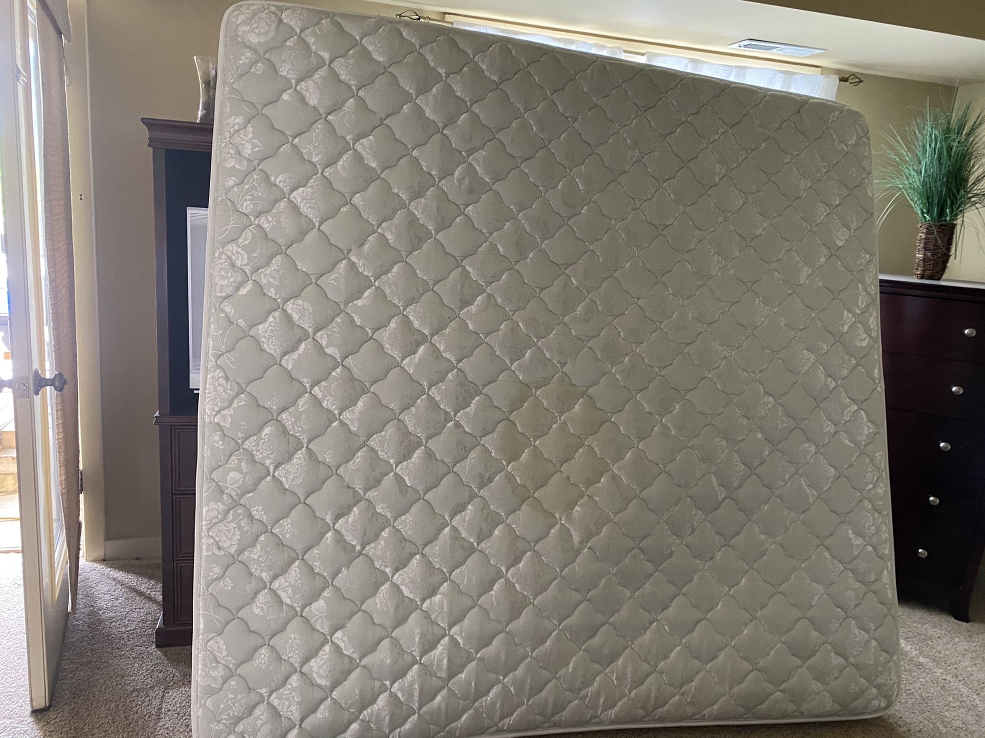 King size mattress in good condition.