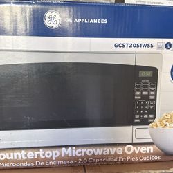 GE SS 2.0 cub counter microwave new