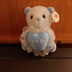 IT'S A BOY BLUE AND WHITE BEAR, WITH TAGS.