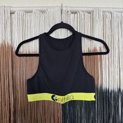Black Ethika high neck performance style sports bra with neon yellow accents; excellent condition