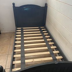 Twin wood bed frame.