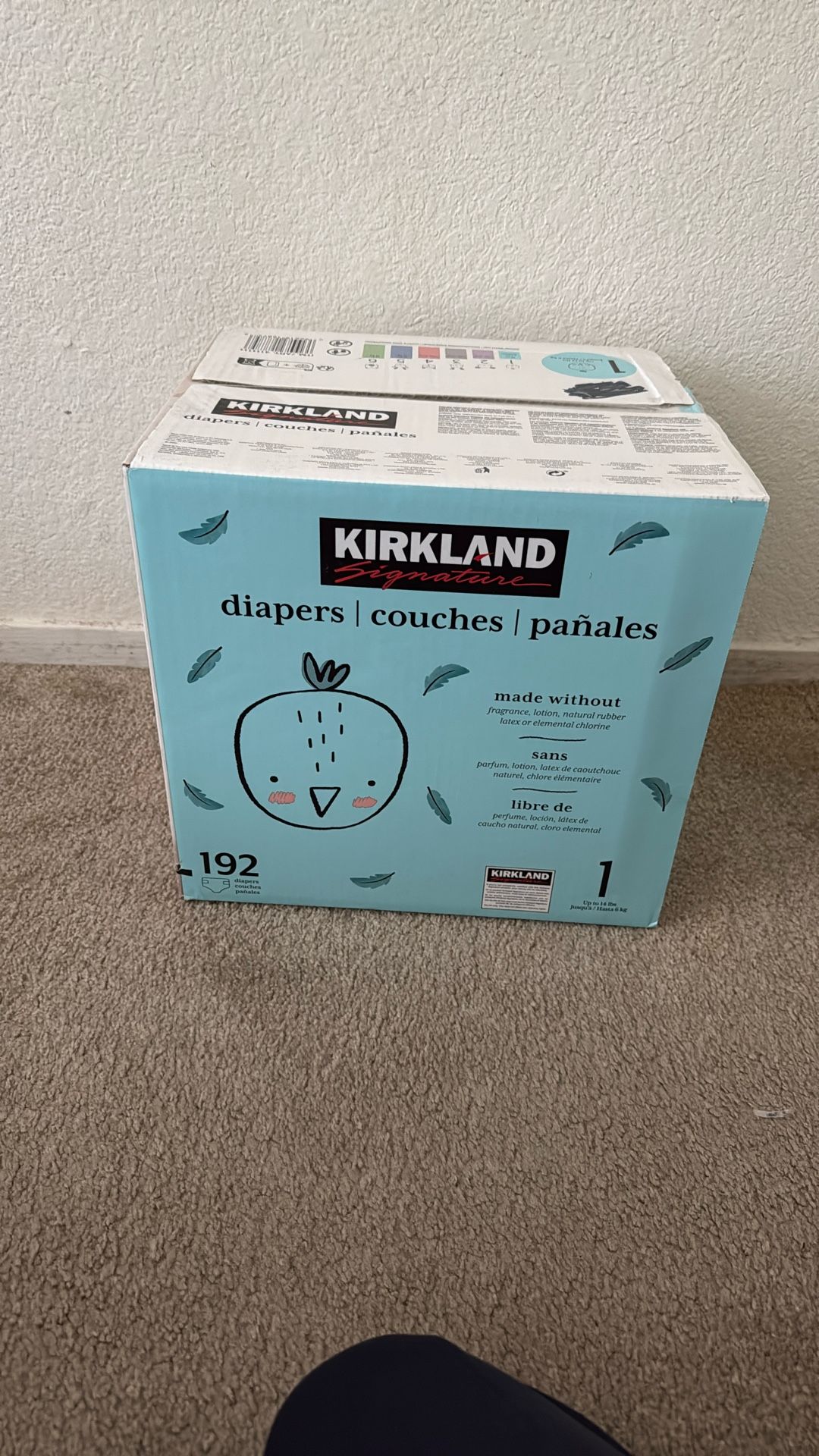 box of new, unopened size 1 diapers