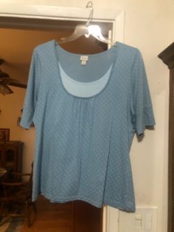 Womens Size 18 / 20 Short Sleeve top.  Longer length.  Light blue with a lighter blue inlet in the front.  Made Of 100% Cotton.  Brand New Never Worn 