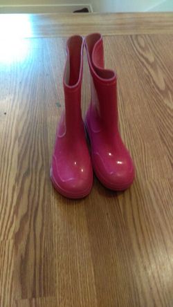 Pink rain boots