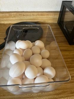 Egg container holder .