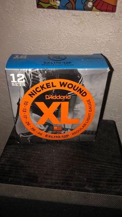 12 sets nickel wound DAddario 10’s guitar strings