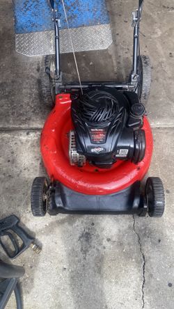 Troy Bilt lawnmower 22 inch cut big wheel new carburetor pull at one time cut your grass all the time lol issues with this machine