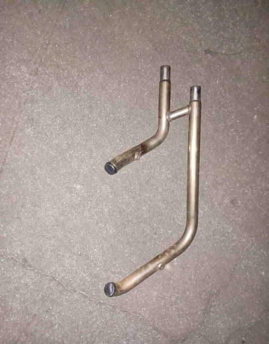 genuine Harley-Davidson exhaust header pipe assembly.