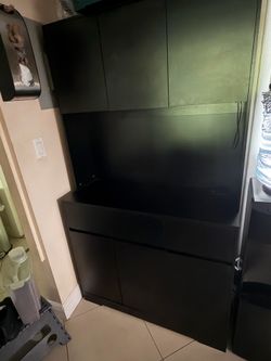 Esmlada 71'' Tall Kitchen Pantry cabinet with power outlet