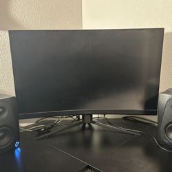 Curved Monitor And Speakers 