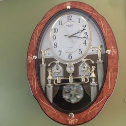 Musical wall clock