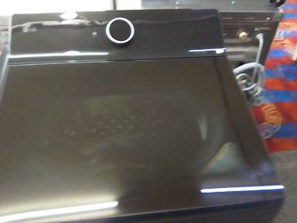 LG SMART WASHER MINT CONDITION IT'S A HIGH-END WASHER  VERY WELL TAKE CARE OF LG BLACK ON BLACK LIKE I SAID MINT CONDITION PRICE $1,300 DOLLAR FIRM ON