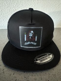 Santa Muerte Black Snapback Trucker Hat