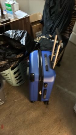 Blue 24 inch rolling suitcase brand new