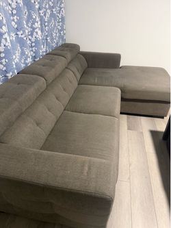 Gray Pull-Out Sleeper Sofa – storage