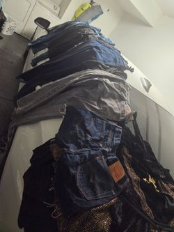 Exactly 65 articles of clothing 80% woman's s-m-L 20% men's L-XL