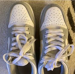 Gray and white Nike Dunks