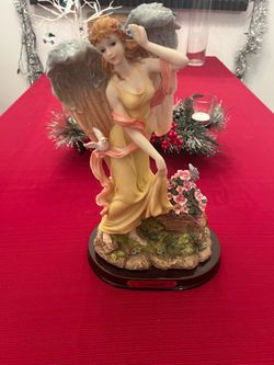 Angel Figurine with Dove and Flowers