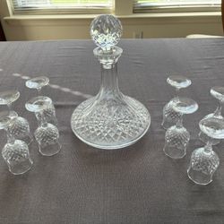 Waterford Heavy Crystal Decanter and Set of 5 Crystal Cordial Glasses, very good condition.  Decanter 10” height, likely Lismore pattern.  Glasses 5” 
