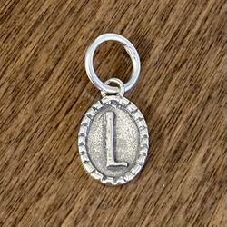 Waxing Poetic Sterling Silver Initial Jewelry Charm IMPRINTED OVAL, Letter “L”