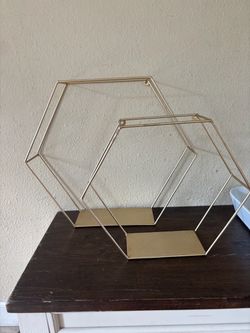 Two gold shelves