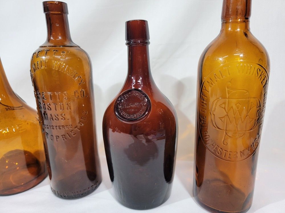 4 Antique Marlt Whiskey Bottles