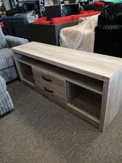 New Grey TV stand all assembled and ready for delivery or new in box. $250