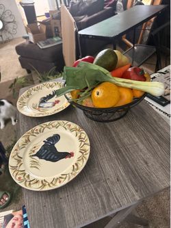 Plates and fake fruit